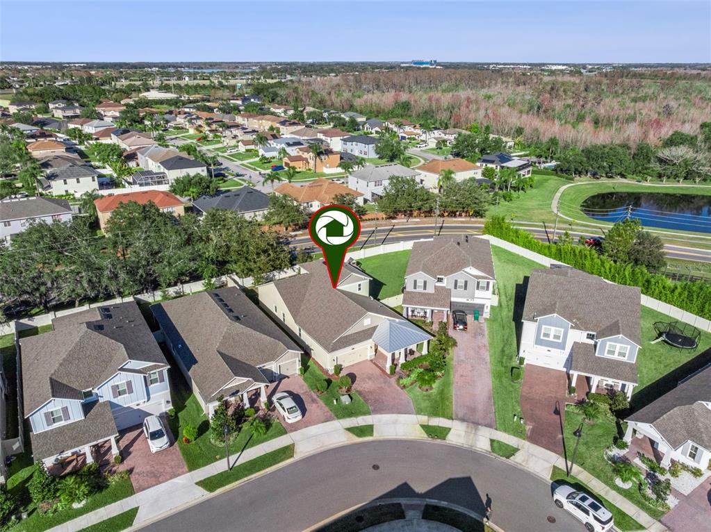 14345 Wabasso Loop Winter Garden, FL 34787 - Photo 30 of 31 an aerial view of a city with lots of residential buildings