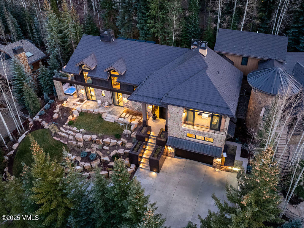 254 Beaver Dam Road Vail, CO 81657 - Photo 44 of 46 a view of a house with a patio