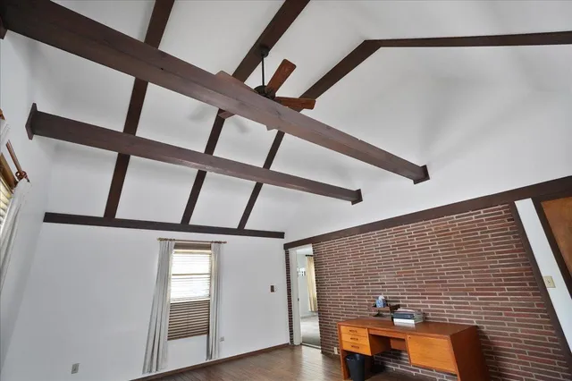 a kitchen with a sink cabinets and window