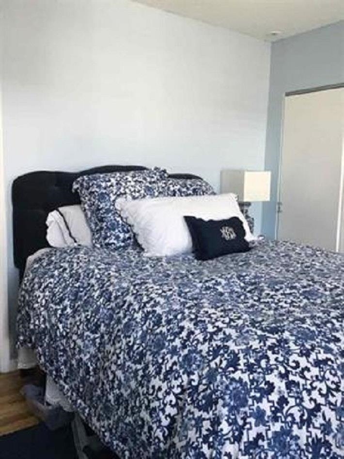 409 Adams Street, Unit 8 Hoboken, NJ 07030 - Photo 12 of 17 a large bed sitting in a bedroom next to a window