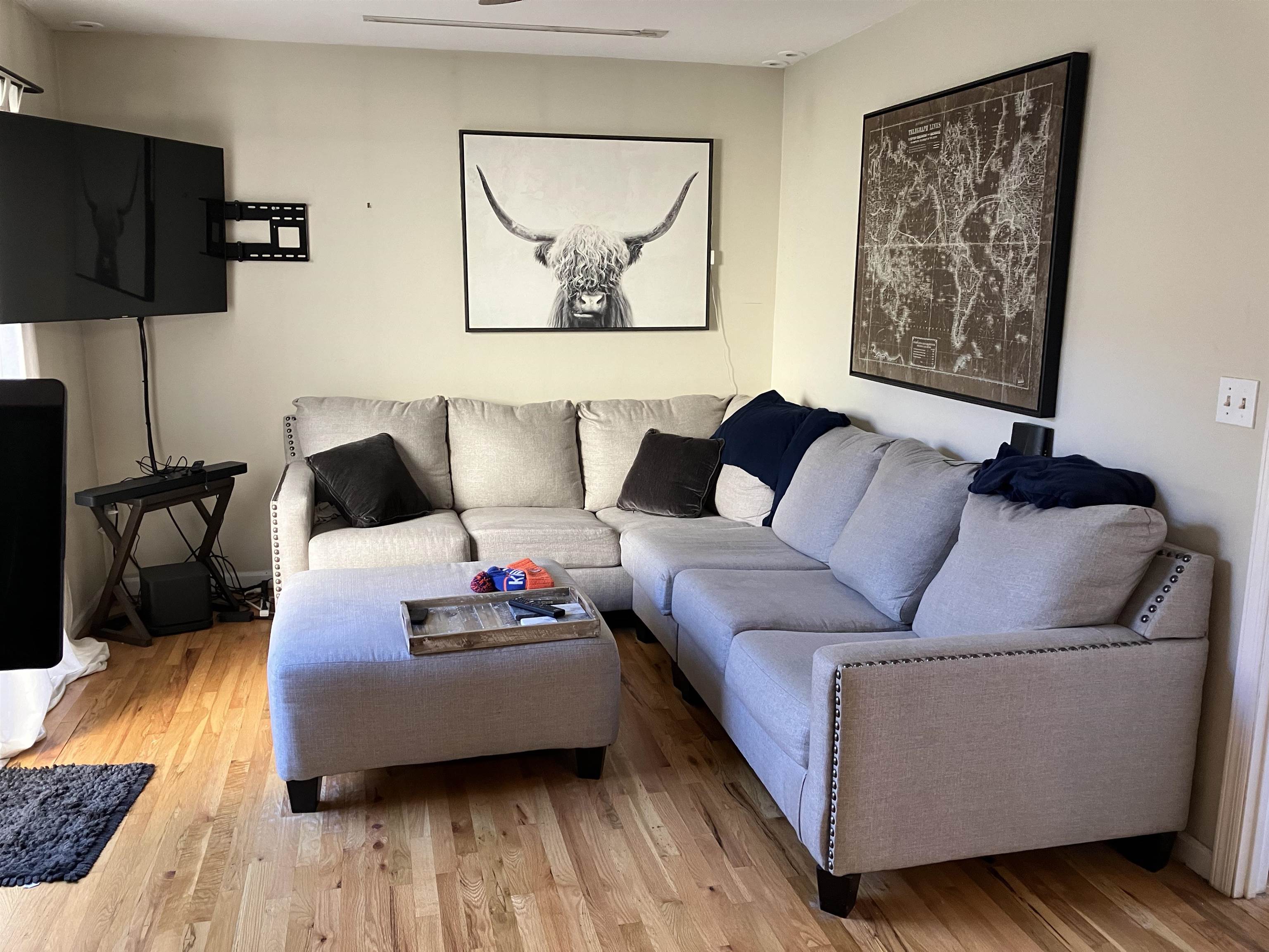 409 Adams Street, Unit 8 Hoboken, NJ 07030 - Photo 4 of 17 a living room with furniture and a wooden floor