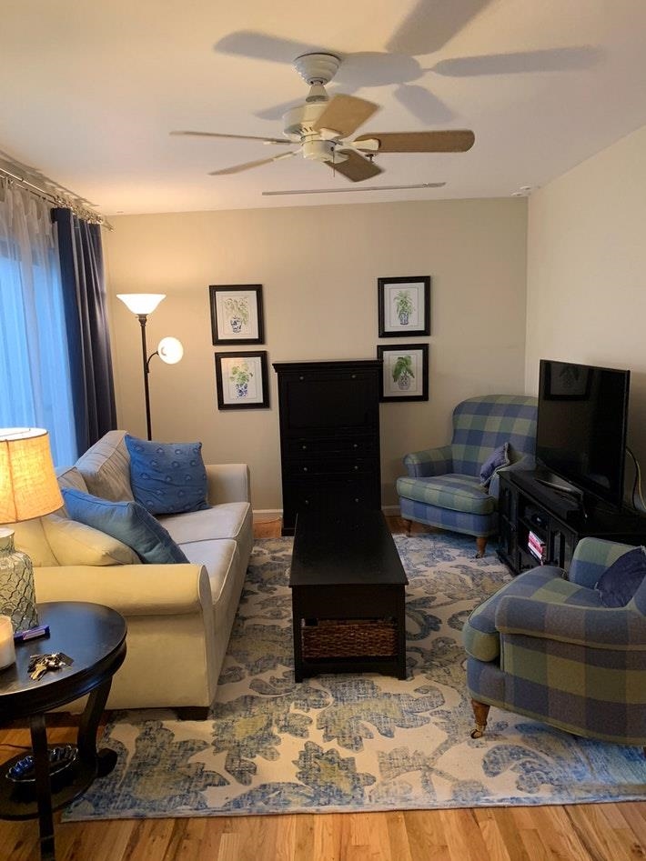 409 Adams Street, Unit 8 Hoboken, NJ 07030 - Photo 5 of 17 a living room with furniture and wooden floor