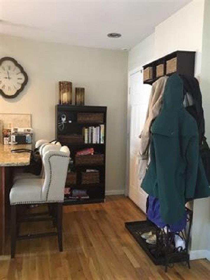 409 Adams Street, Unit 8 Hoboken, NJ 07030 - Photo 10 of 17 a living room with furniture and wooden floor