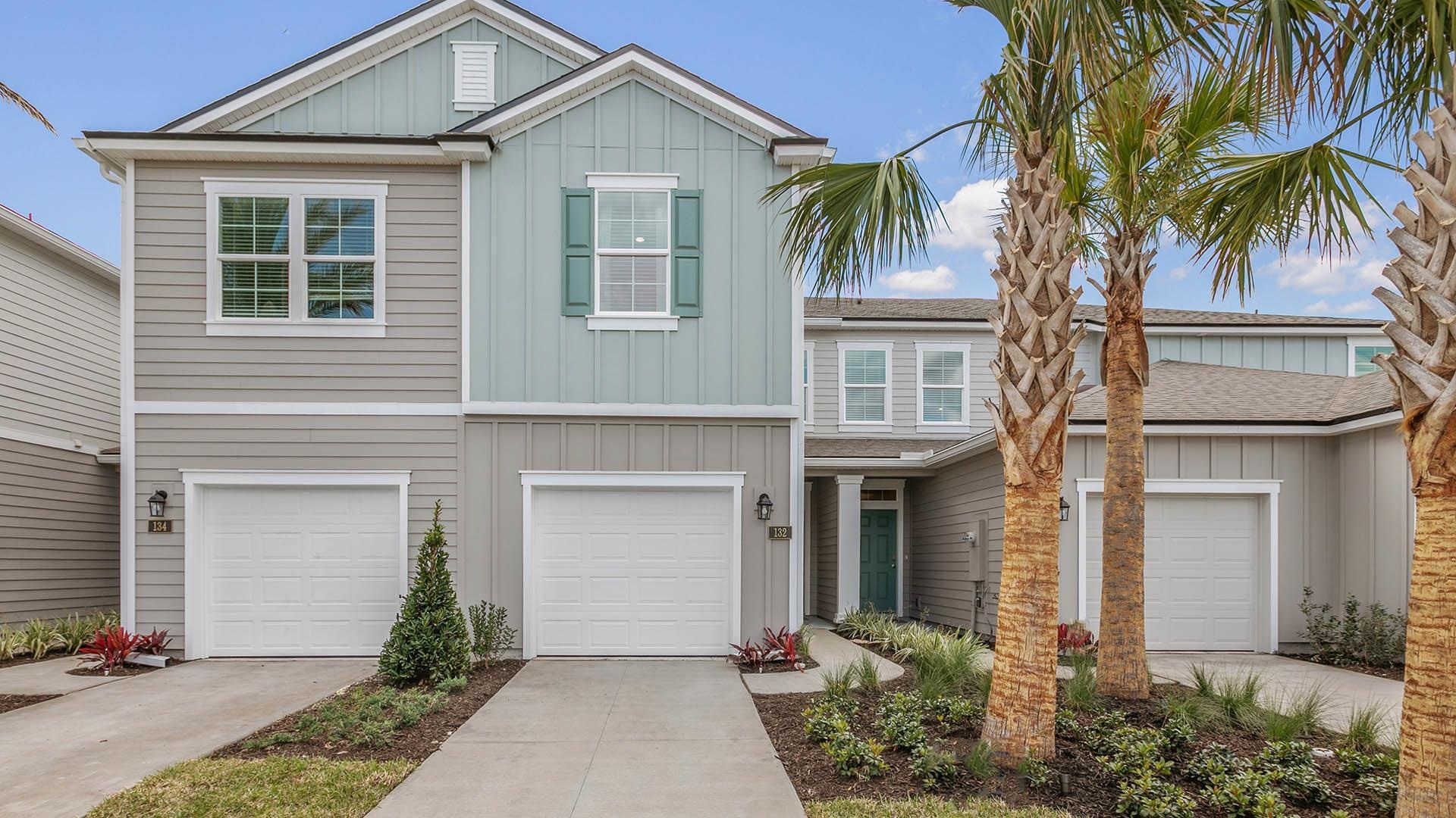 33 Redbud Road Palm Coast, FL 32137 - Photo 1 of 33 front view of a house with a yard
