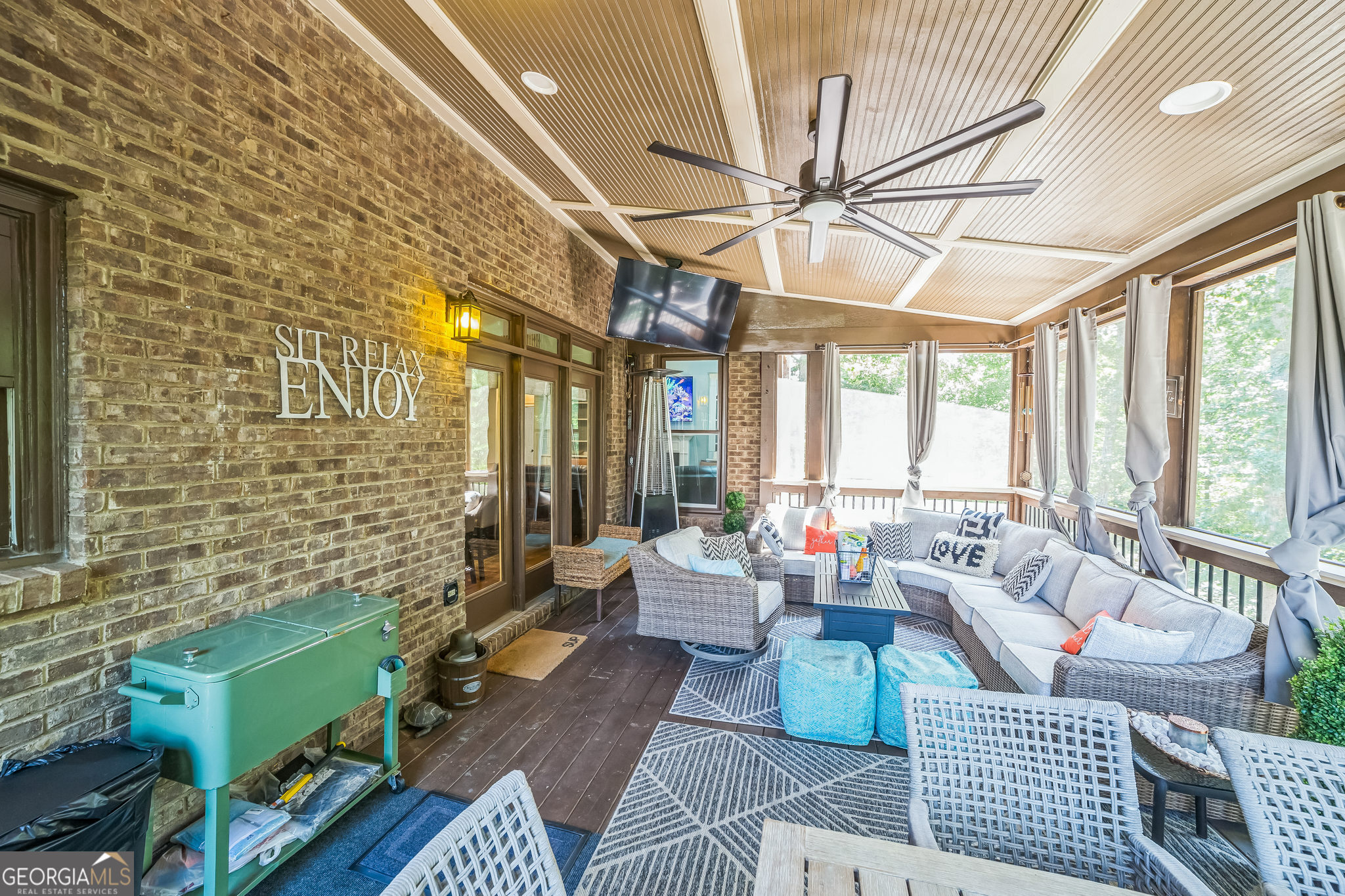 8260 Equinox Lane Fairburn, GA 30213 - Photo 21 of 39 a living room with furniture and a large window