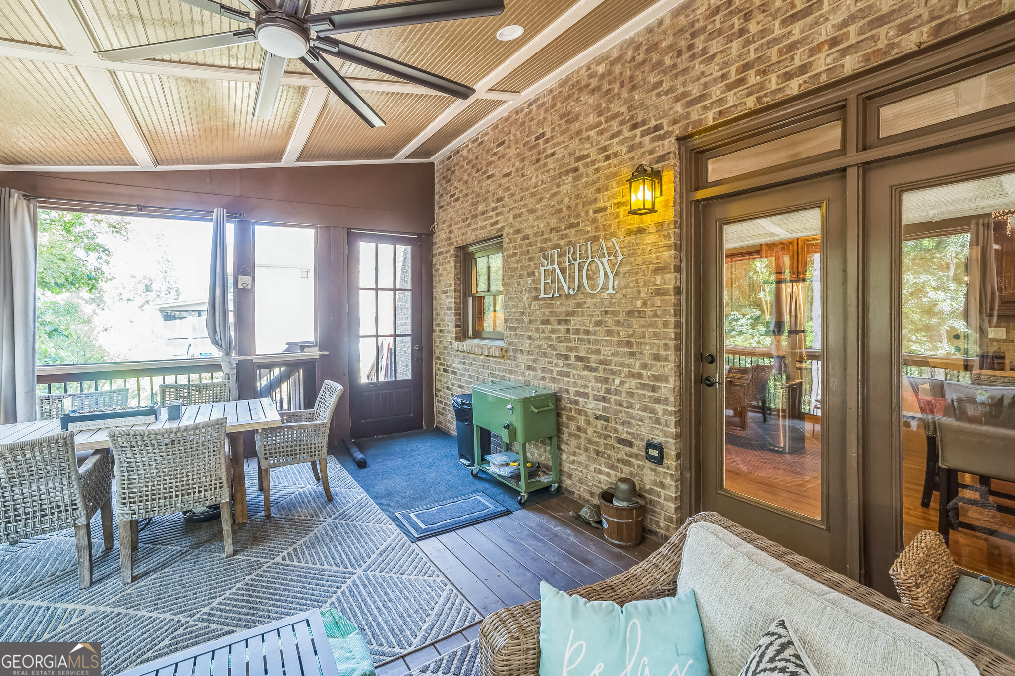 8260 Equinox Lane Fairburn, GA 30213 - Photo 23 of 39 a view of a dining room with furniture wooden floor and a chandelier