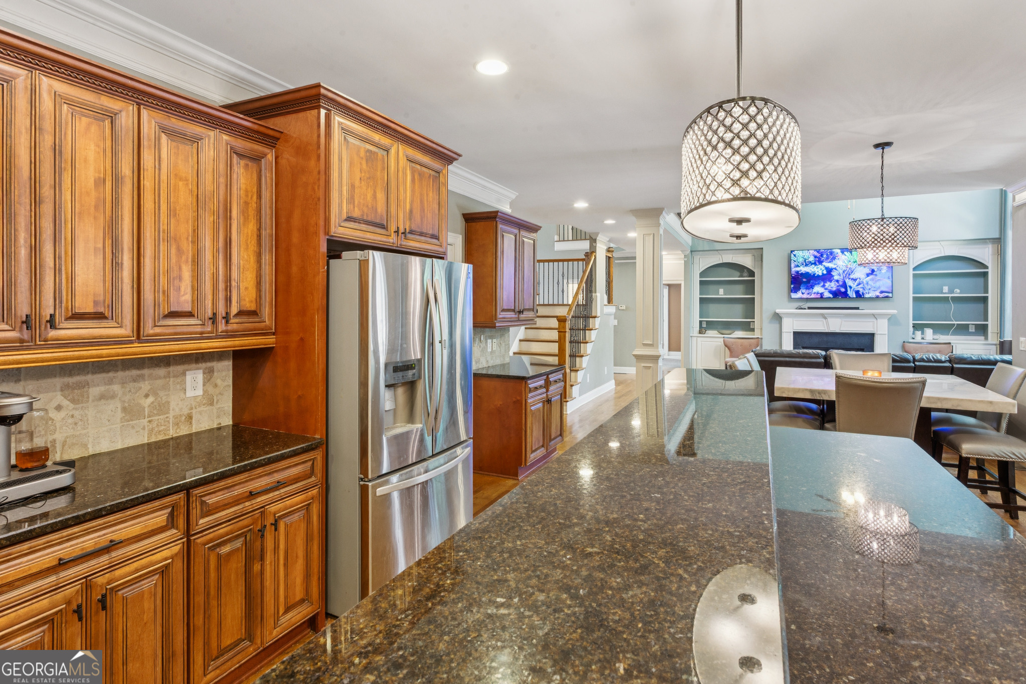 8260 Equinox Lane Fairburn, GA 30213 - Photo 25 of 39 a kitchen with stainless steel appliances granite countertop a stove refrigerator and cabinets