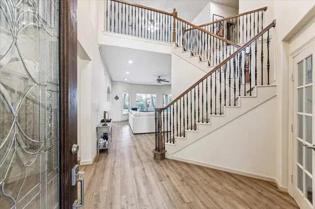 a view of entryway with wooden floor