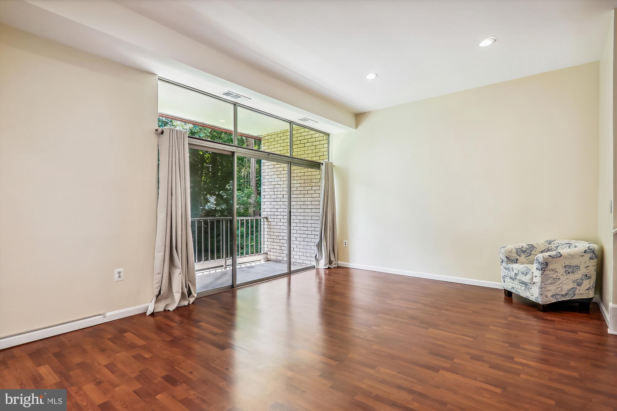 14432 Parkvale Road, Unit 6 Rockville, MD 20853 - Photo 13 of 44 Living Room with Exit to Private Balcony
