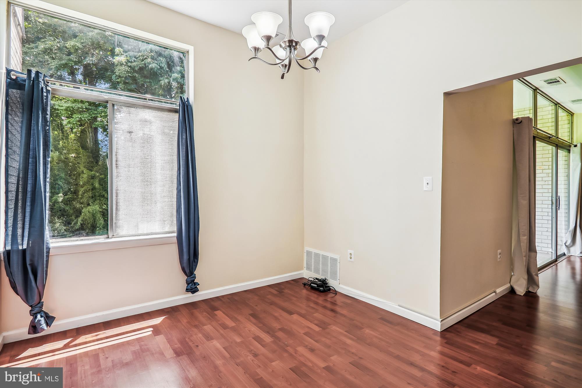 14432 Parkvale Road, Unit 6 Rockville, MD 20853 - Photo 14 of 44 Dining Room with Large Windows & High Ceilings