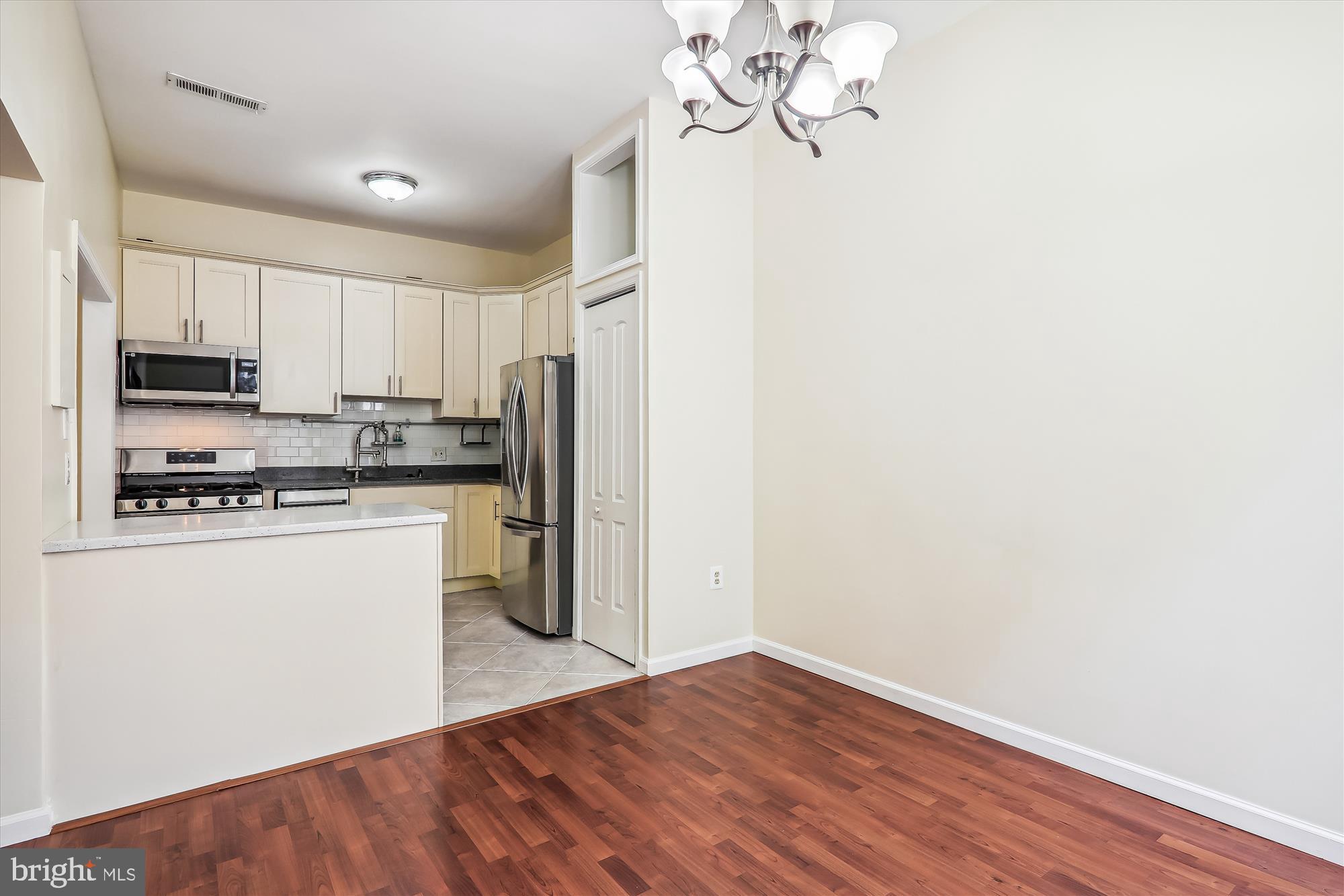 14432 Parkvale Road, Unit 6 Rockville, MD 20853 - Photo 16 of 44 Dining Room Opens to the Kitchen