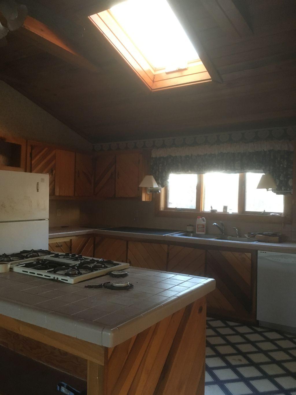 383 Green Meadow Road Sparta, TN 38583 - Photo 13 of 37 Kitchen Island Skylight Refrigerator