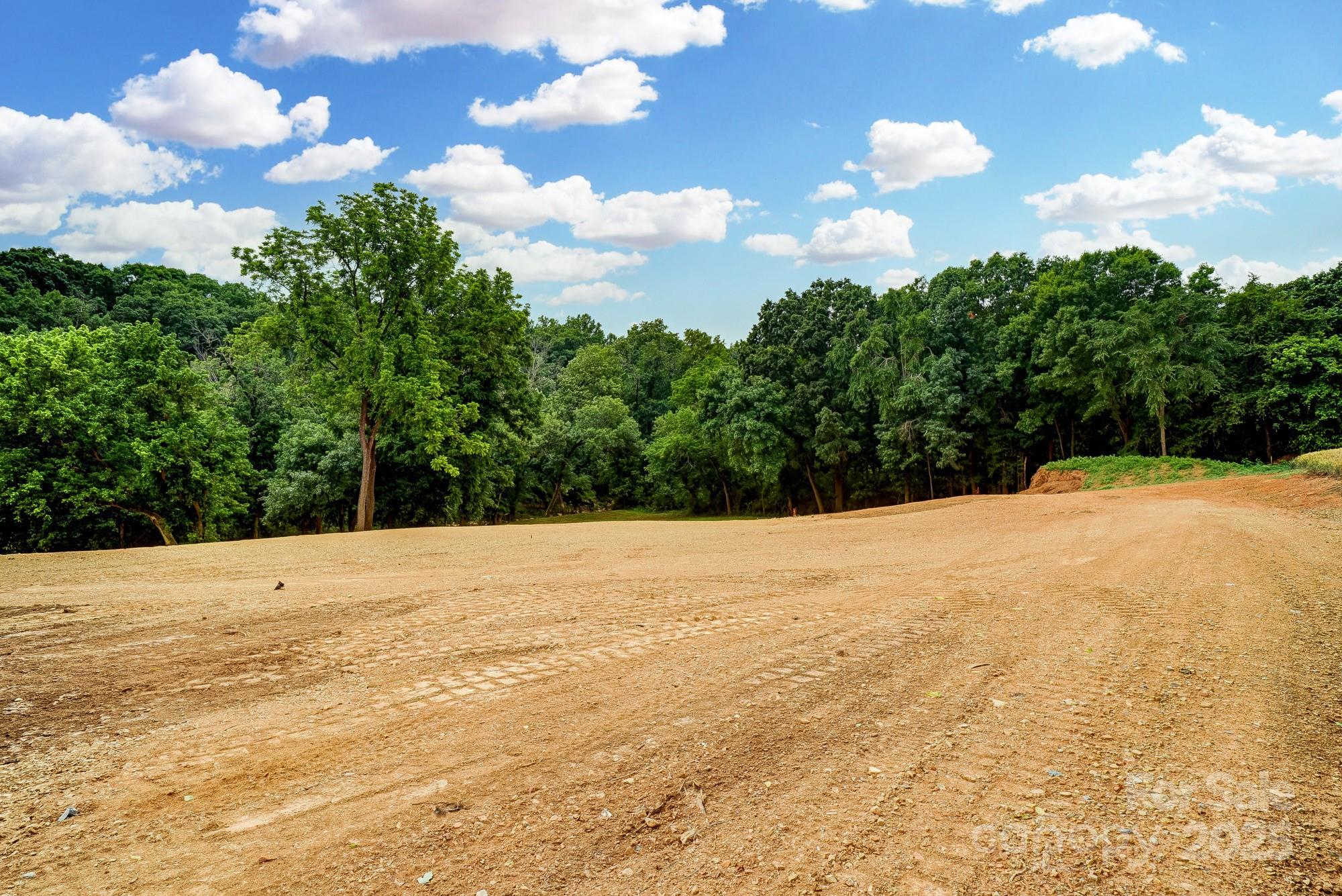 a view of an ocean beach and mountain