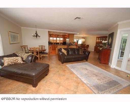 12 Ridge Boulevard Ocean Ridge, FL 33435 - Photo 4 of 13 a living room with furniture and wooden floor