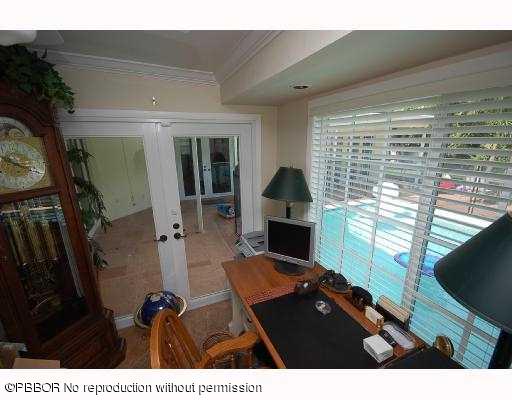 12 Ridge Boulevard Ocean Ridge, FL 33435 - Photo 8 of 13 a living room with furniture