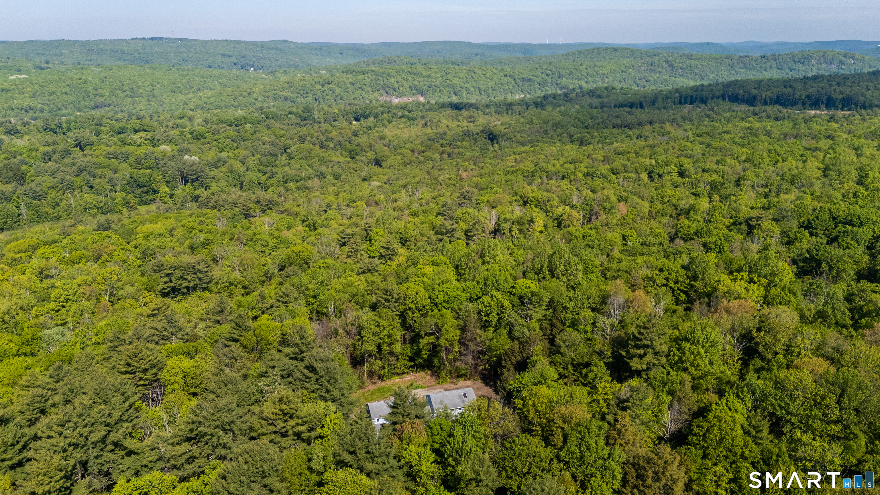 315 West Hill Road Torrington, CT 06790 - Photo 35 of 40 a view of a field with a tree
