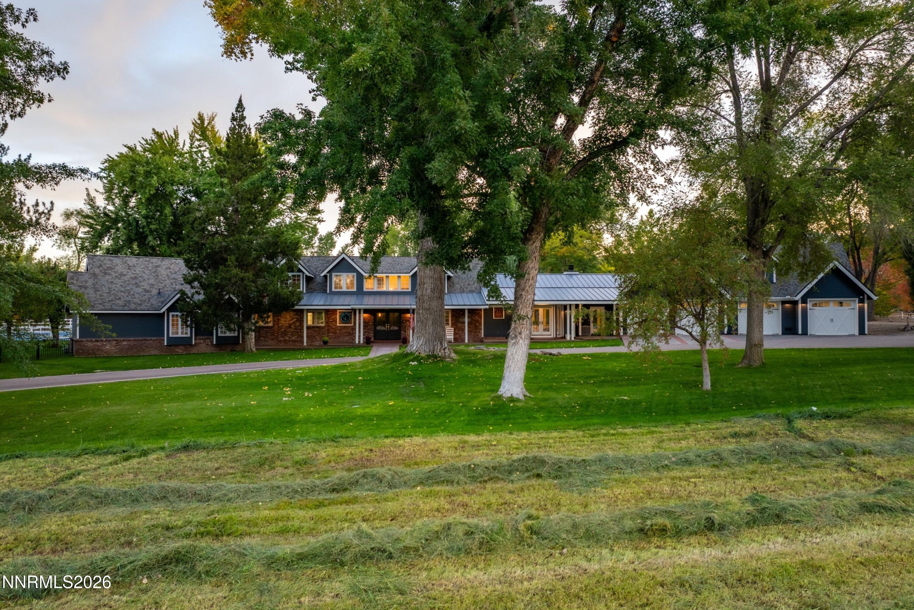 1500 Holcomb Ranch Lane Reno, NV 89511 - Photo 22 of 117 022_130-print-1500_holcomb_drone_twiligh