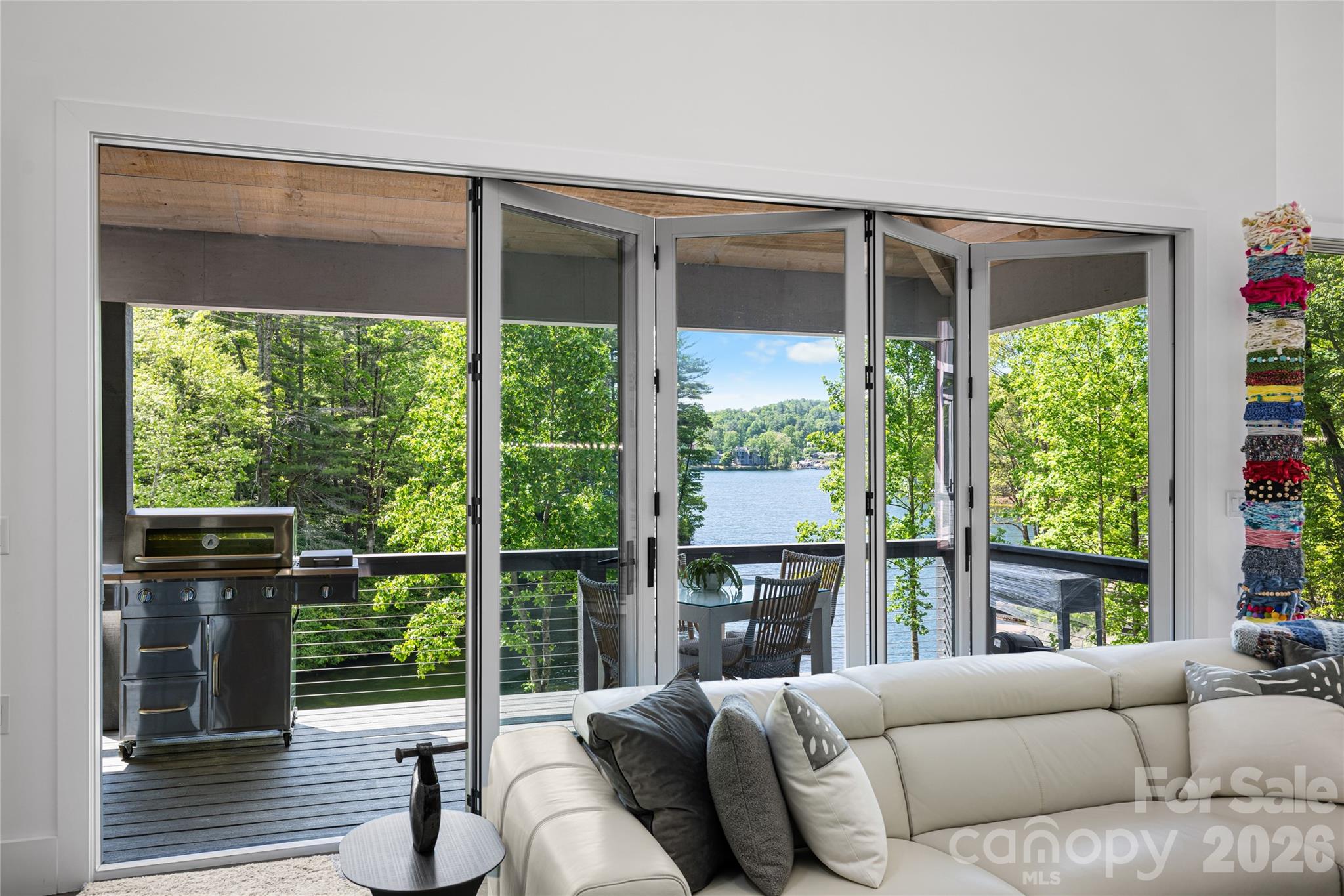 2235 Cold Mountain Road Lake Toxaway, NC 28747 - Photo 4 of 47 a living room with couch and a window