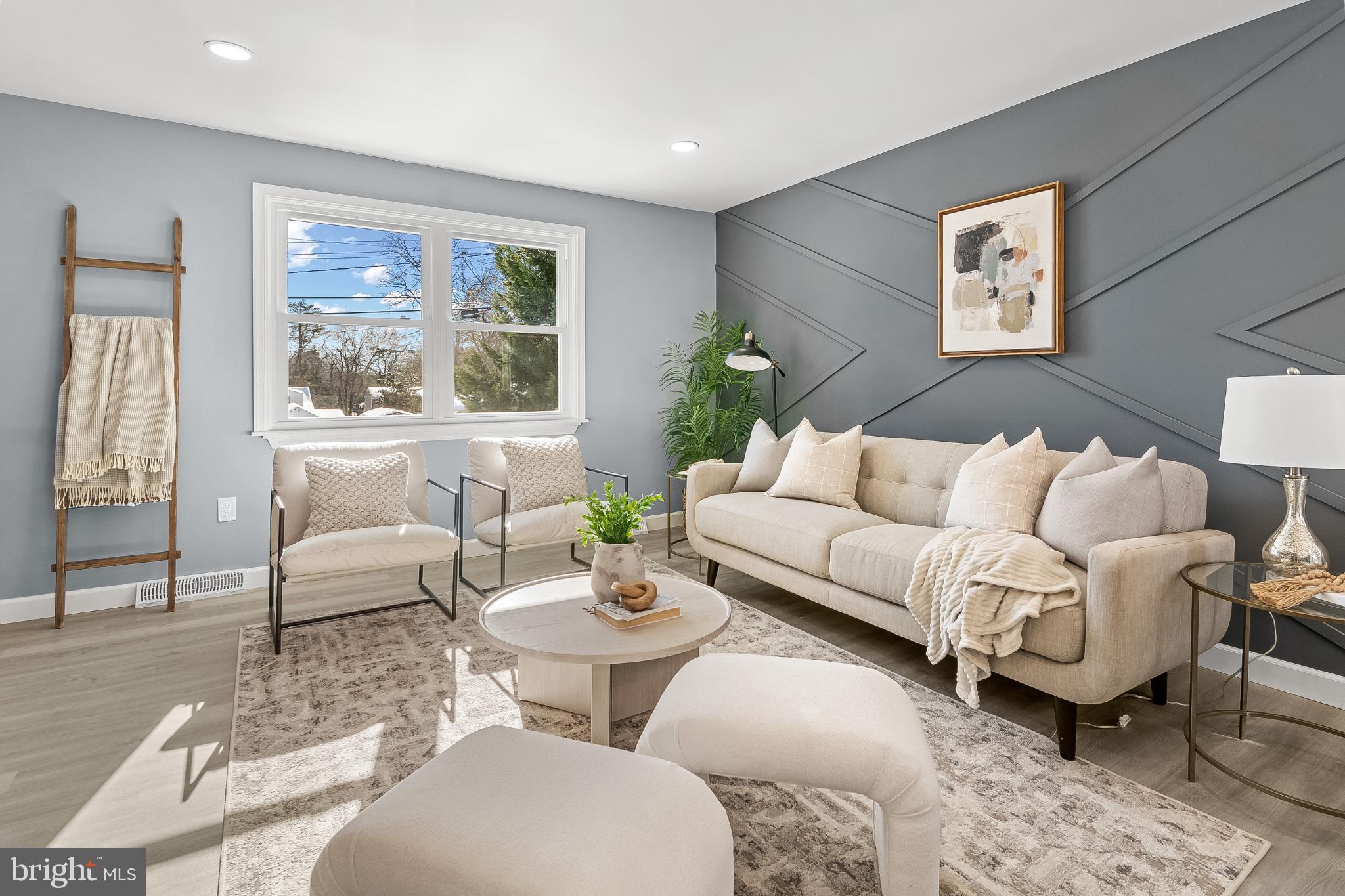 1402 Valley Creek Road Severn, MD 21144 - Photo 21 of 46 Modern elegance in a sunlit living space.