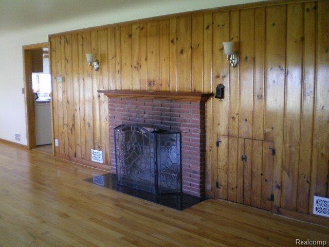 1561 Sisson Road Imlay City, MI 48444 - Photo 10 of 25 Natural fireplace in living room
