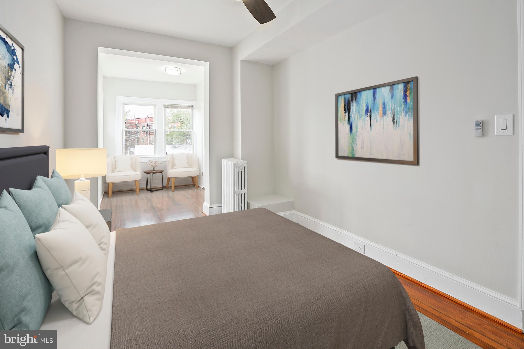 228 17th Street Northeast Washington, DC 20002 - Photo 12 of 31 Primary bedroom with attached sunroom