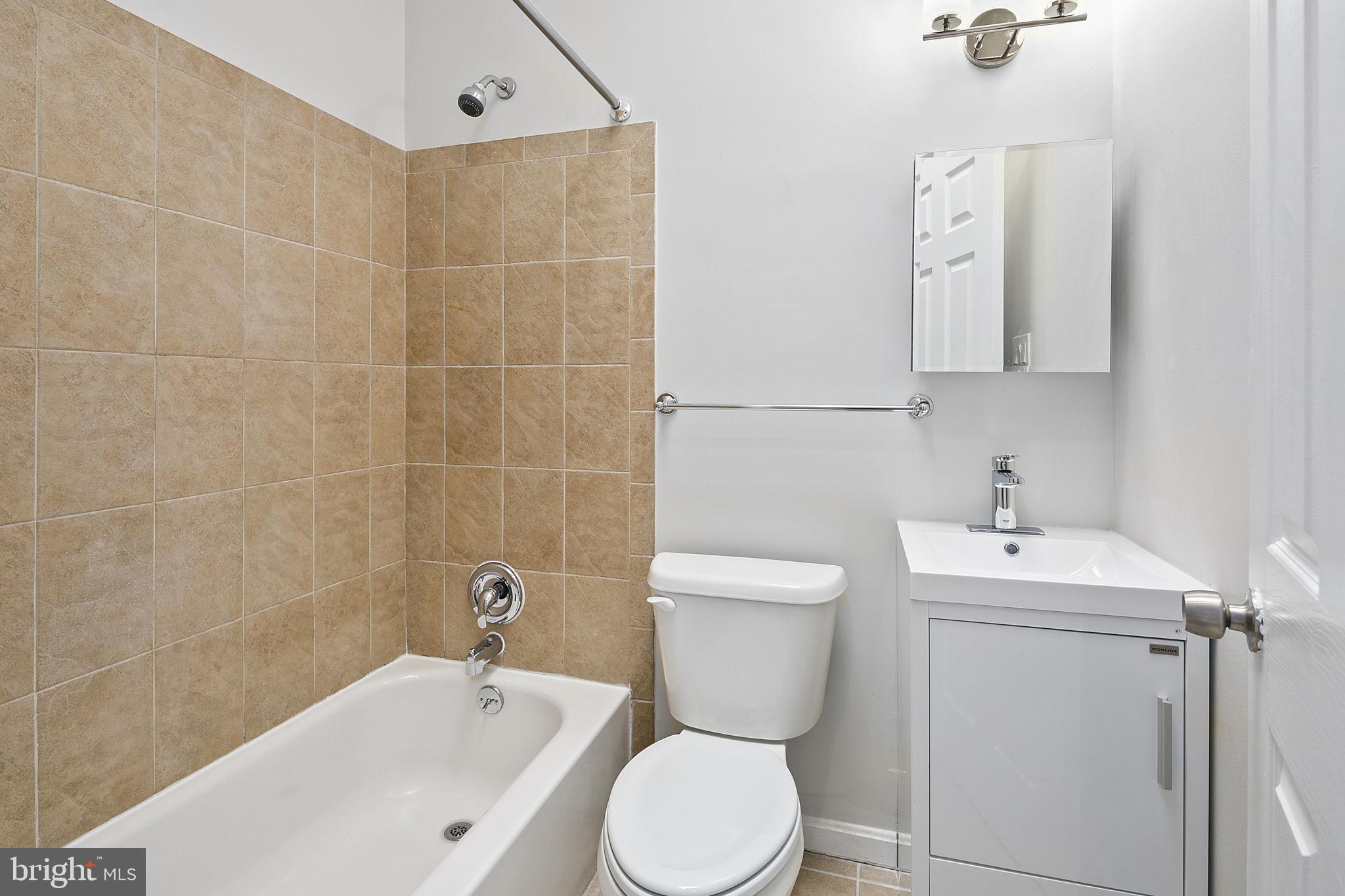 228 17th Street Northeast Washington, DC 20002 - Photo 17 of 31 2nd full bathroom on upper level