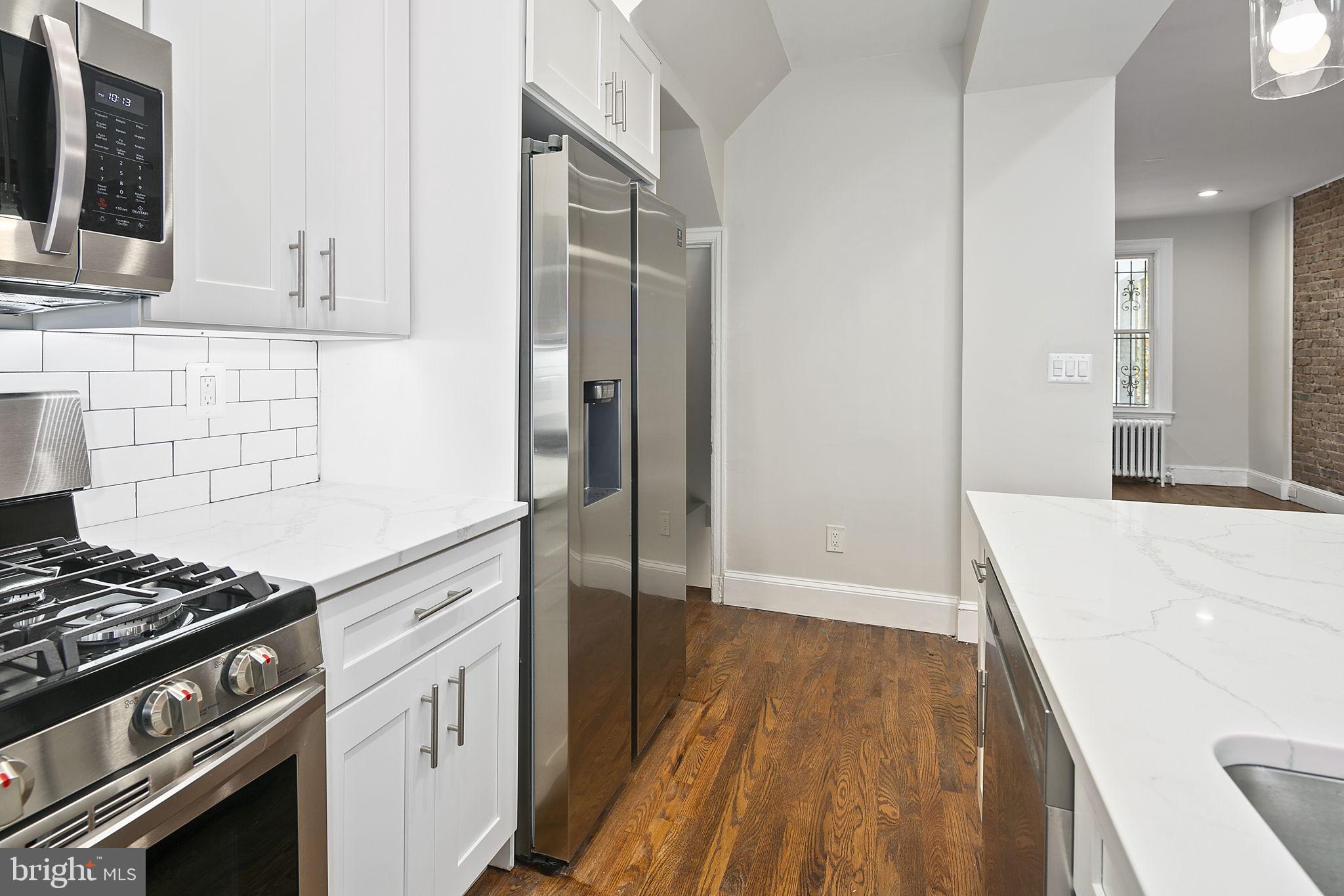 228 17th Street Northeast Washington, DC 20002 - Photo 10 of 31 Bright white kitchen