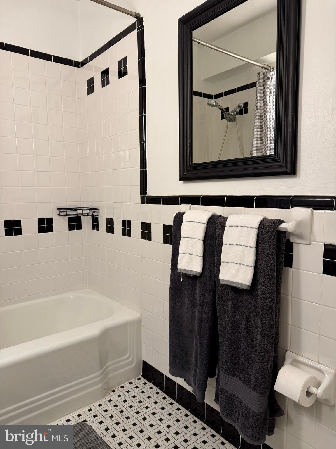 2500 Q Street Northwest, Unit 307 Washington, DC 20007 - Photo 13 of 17 a bathroom with a bathtub and a shower