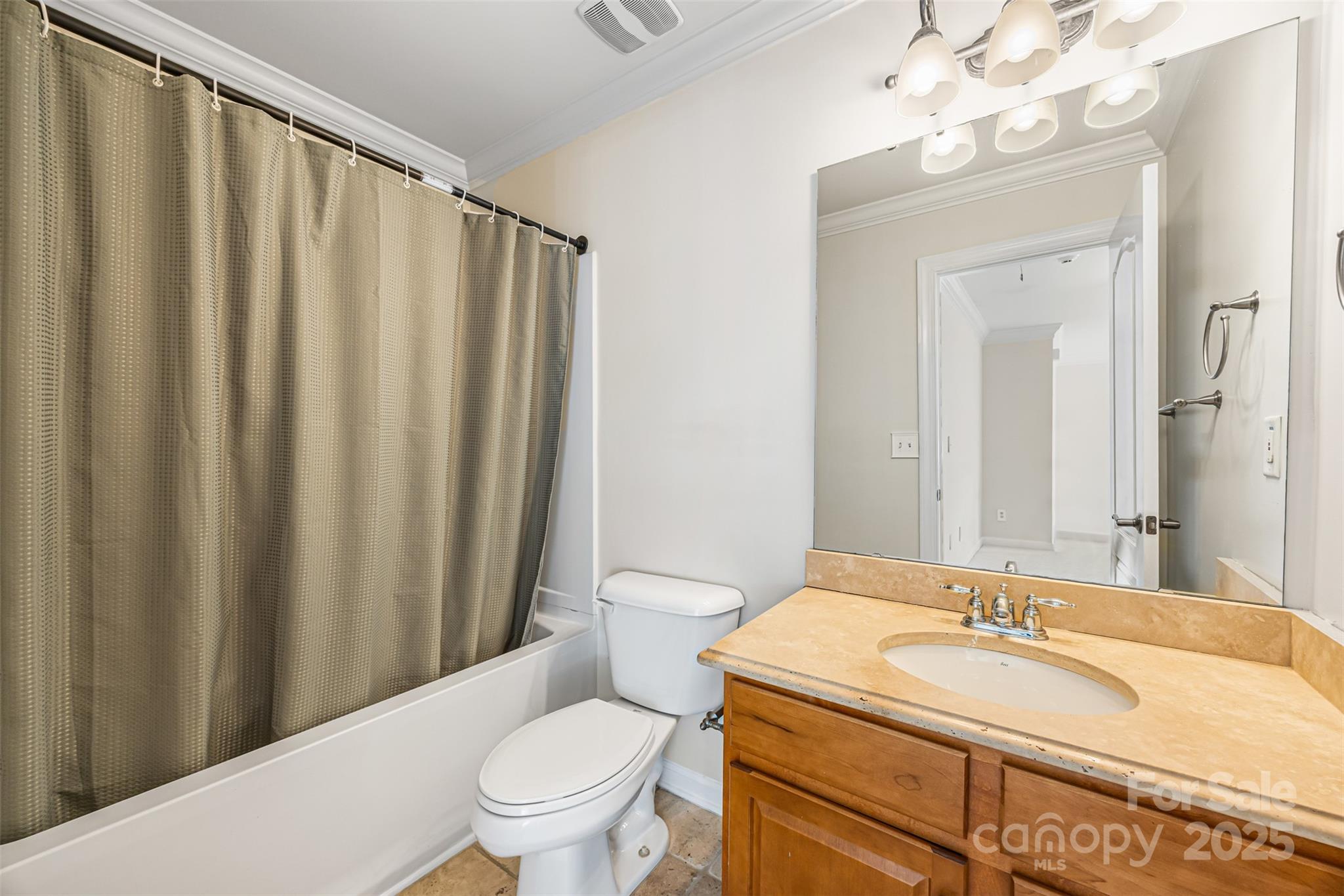 6729 Dusty Saddle Road Charlotte, NC 28277 - Photo 35 of 44 a bathroom with a granite countertop sink toilet and a mirror