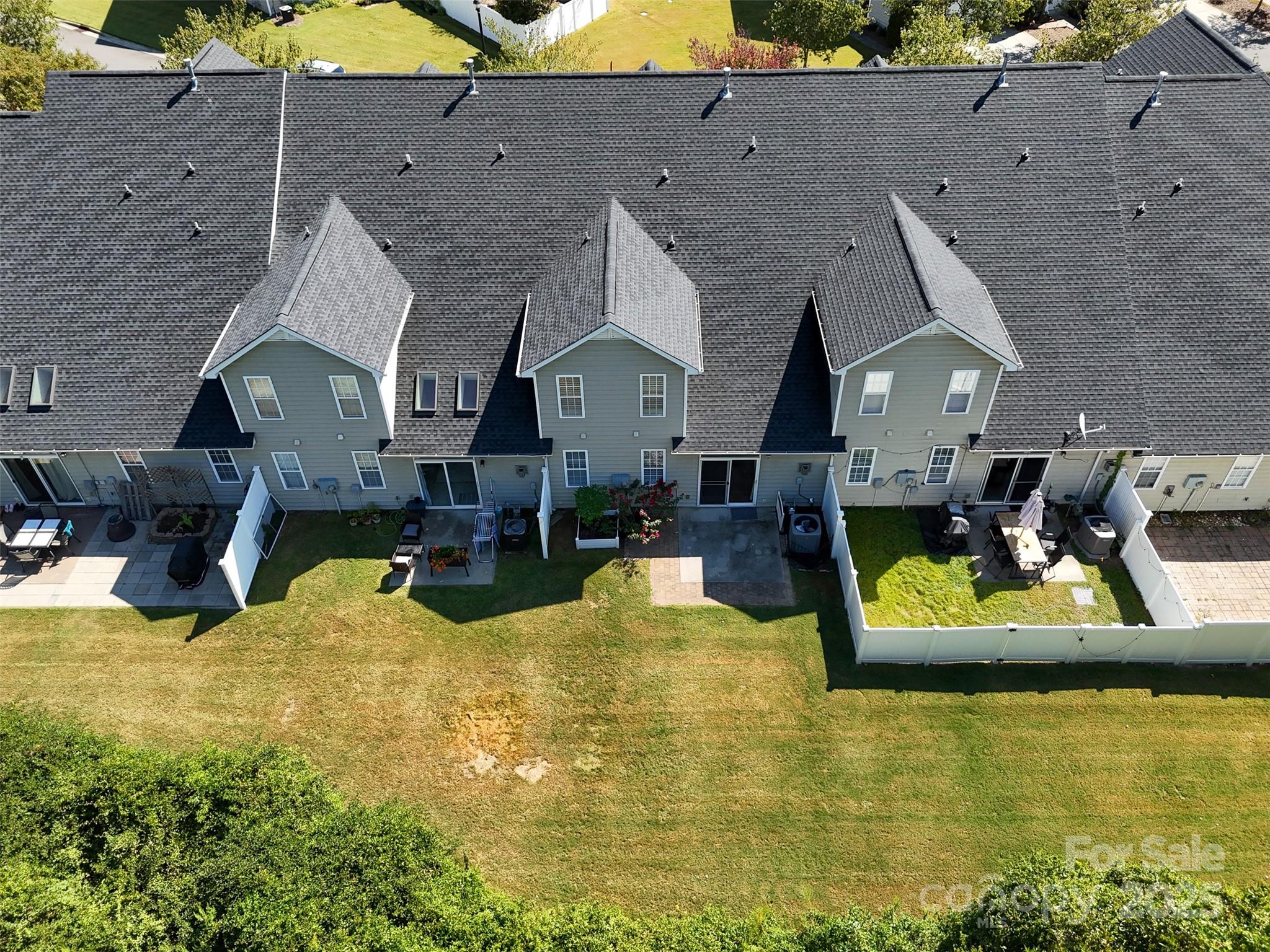 6729 Dusty Saddle Road Charlotte, NC 28277 - Photo 40 of 44 a view of a house with swimming pool