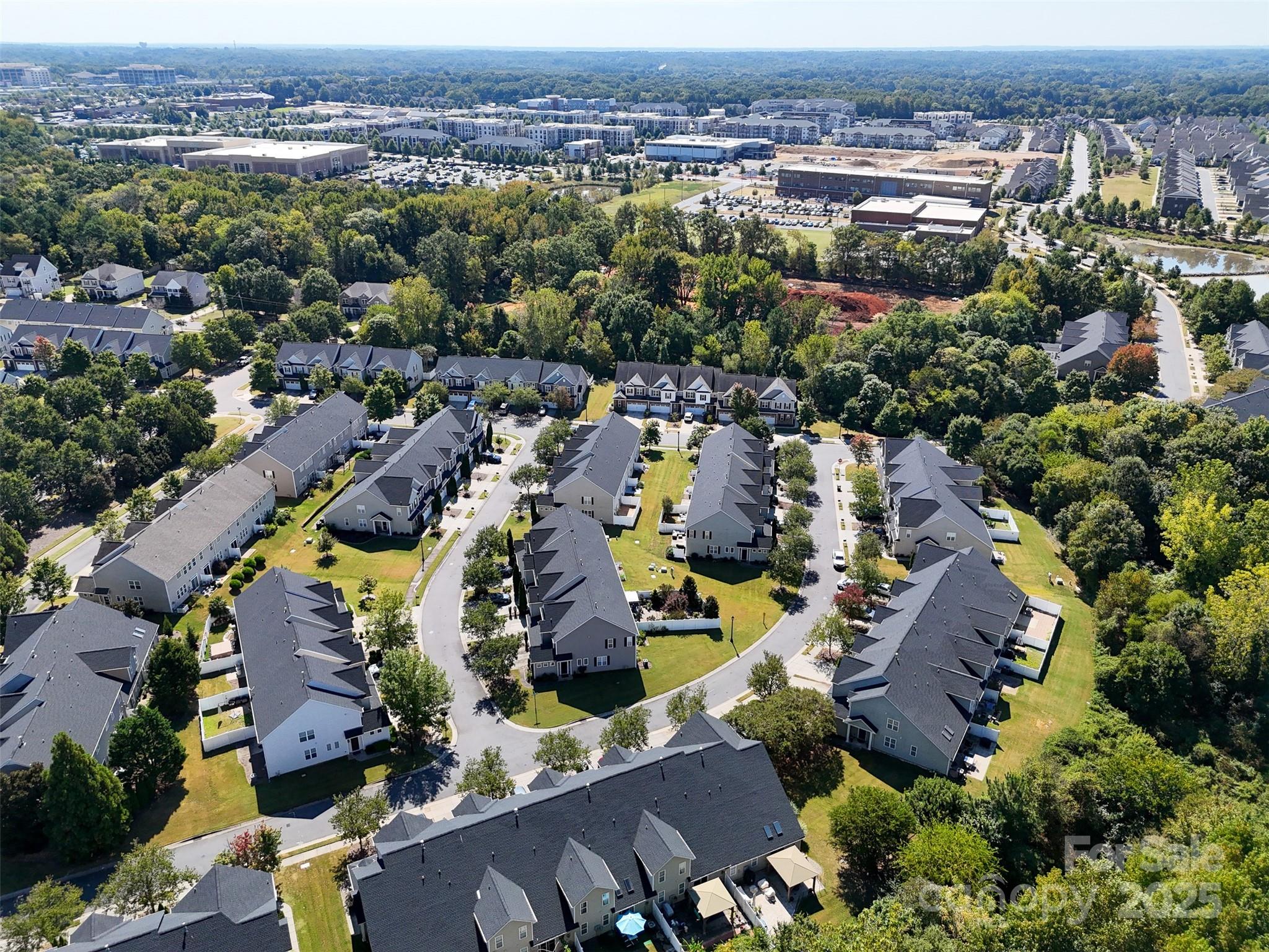 6729 Dusty Saddle Road Charlotte, NC 28277 - Photo 42 of 44 an aerial view of house with yard and ocean view