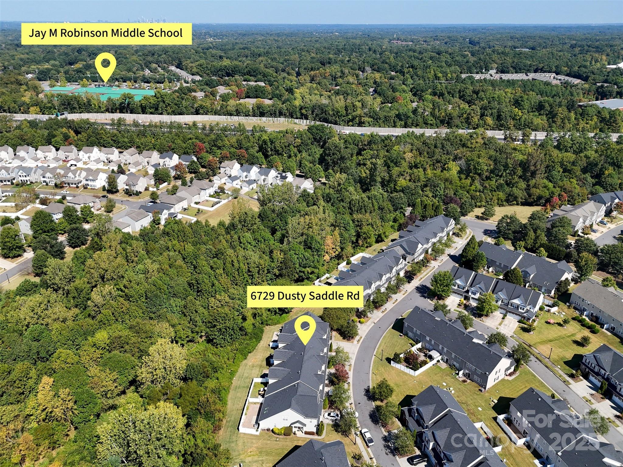 6729 Dusty Saddle Road Charlotte, NC 28277 - Photo 44 of 44 an aerial view of residential houses with outdoor space