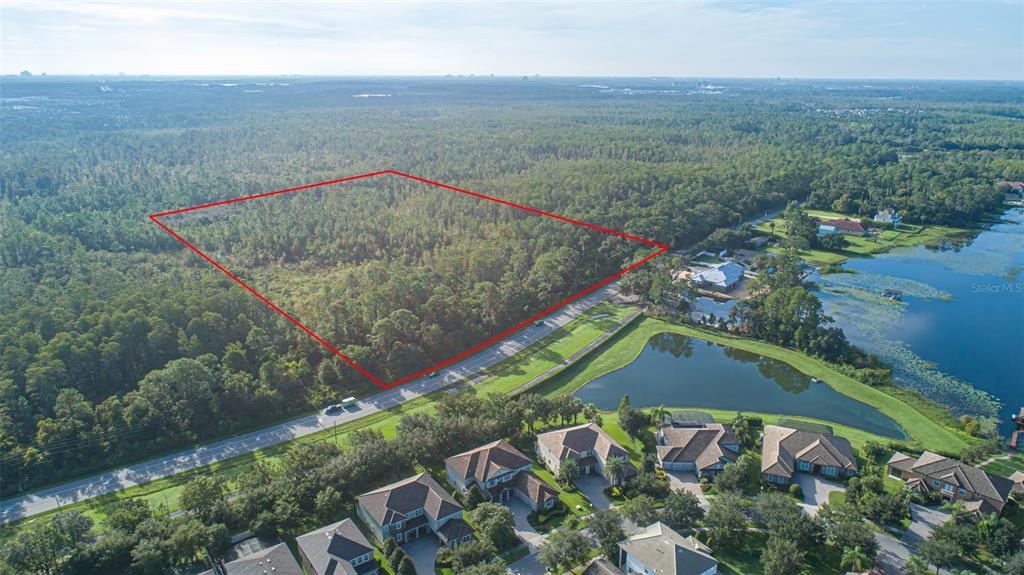 7545 Ficquette Road Windermere, FL 34786 - Photo 10 of 23 an aerial view of a house