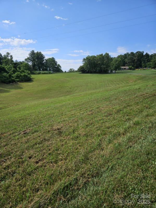 9999 Gabriels Creek Road, Unit 41 Weaverville, NC 28787 - Photo 6 of 18 a view of a field with an ocean