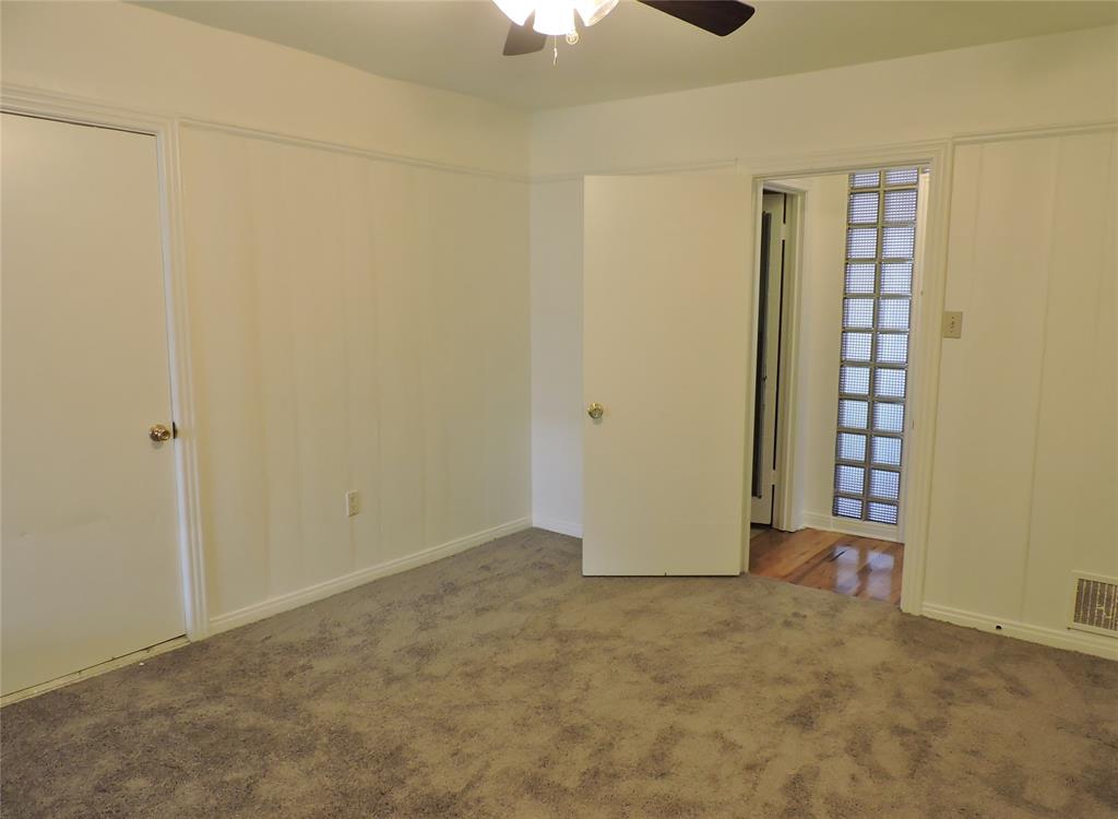 3425 Westcliff Road South Fort Worth, TX 76109 - Photo 10 of 22 Unfurnished bedroom featuring carpet floors and a ceiling fan