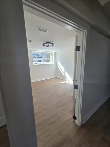 a view of a hallway with entryway