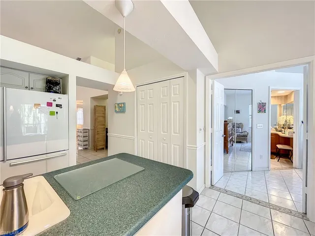 a view of a hallway view with staircase