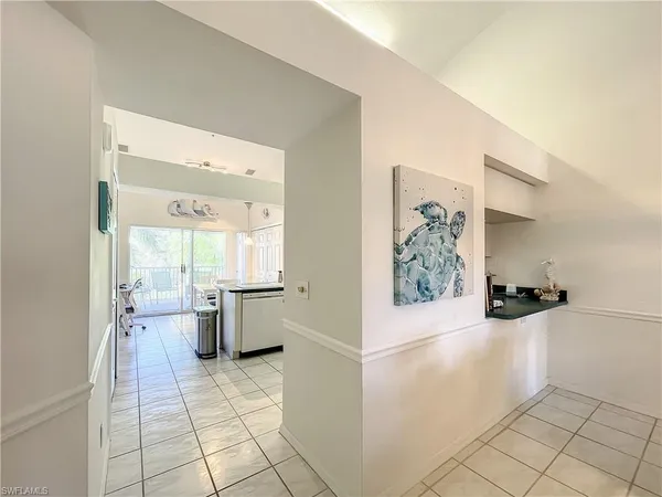a large white room with a large window