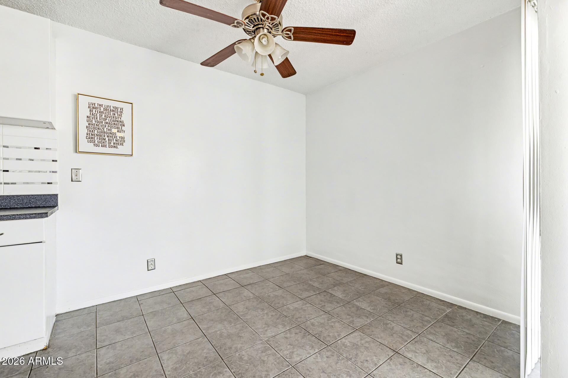 6767 North 7th Street, Unit 217 Phoenix, AZ 85014 - Photo 14 of 31 an empty room with a fan