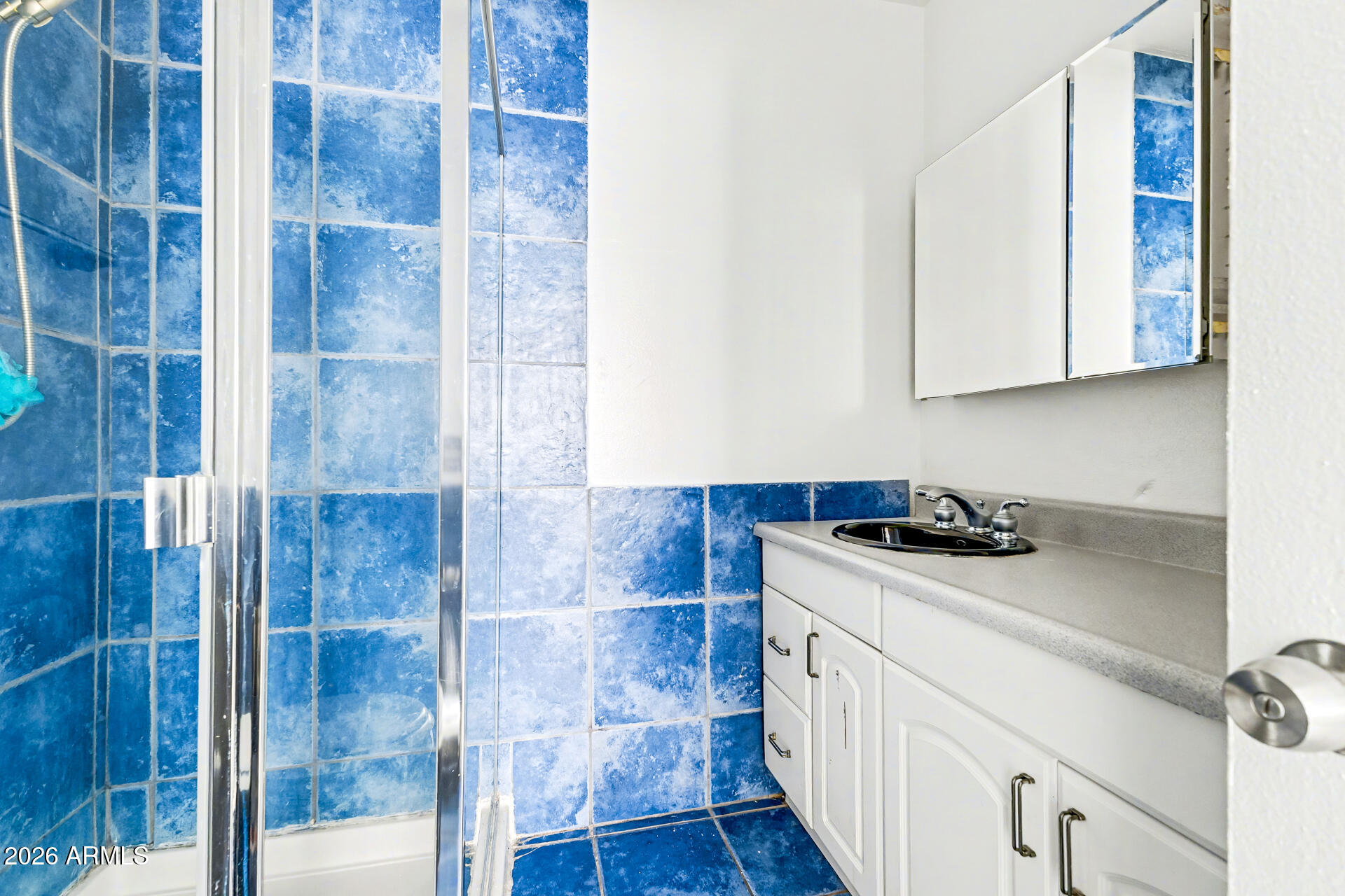 6767 North 7th Street, Unit 217 Phoenix, AZ 85014 - Photo 22 of 31 a kitchen with a sink stove and cabinets