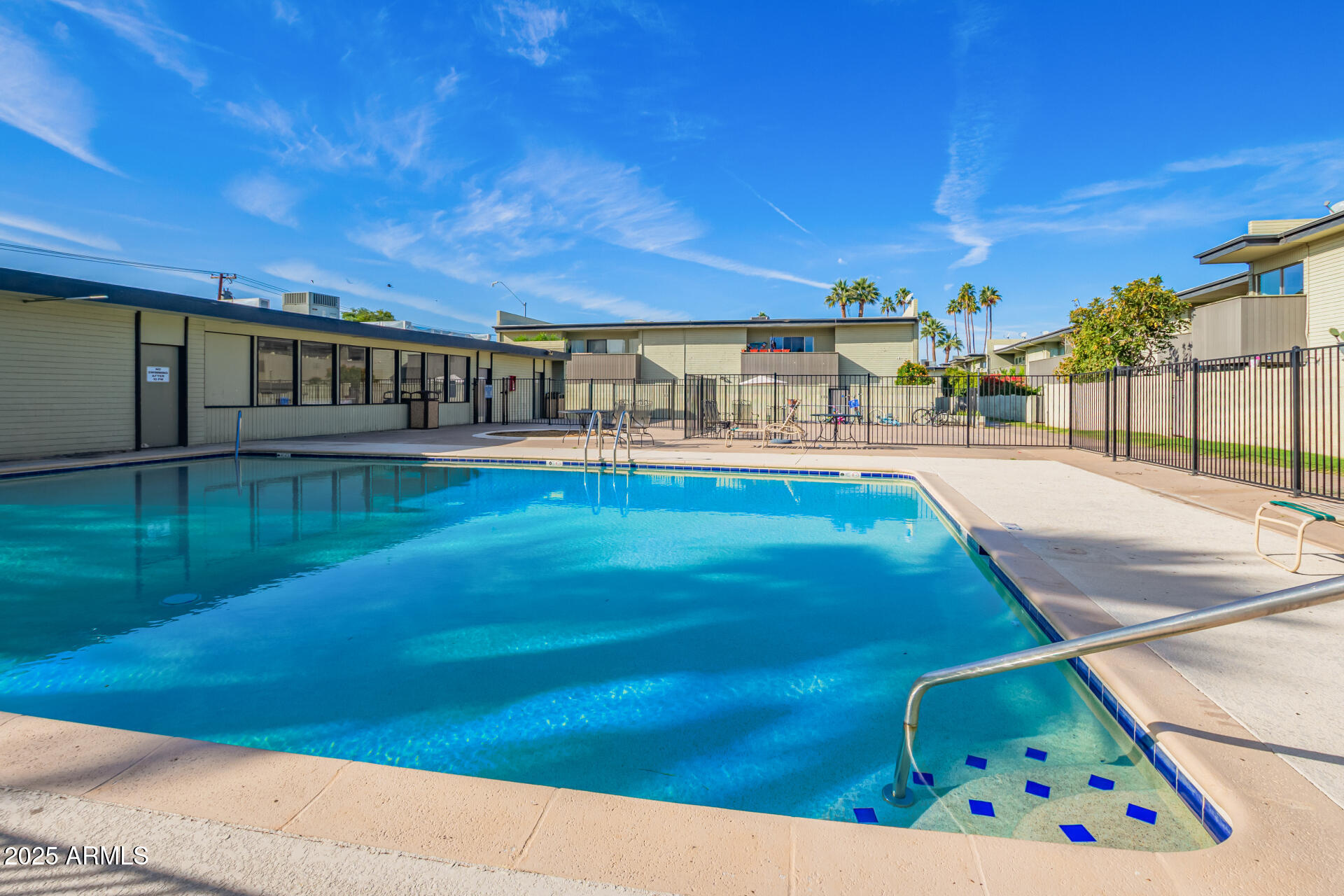6767 North 7th Street, Unit 217 Phoenix, AZ 85014 - Photo 30 of 31 a view of a patio with swimming pool