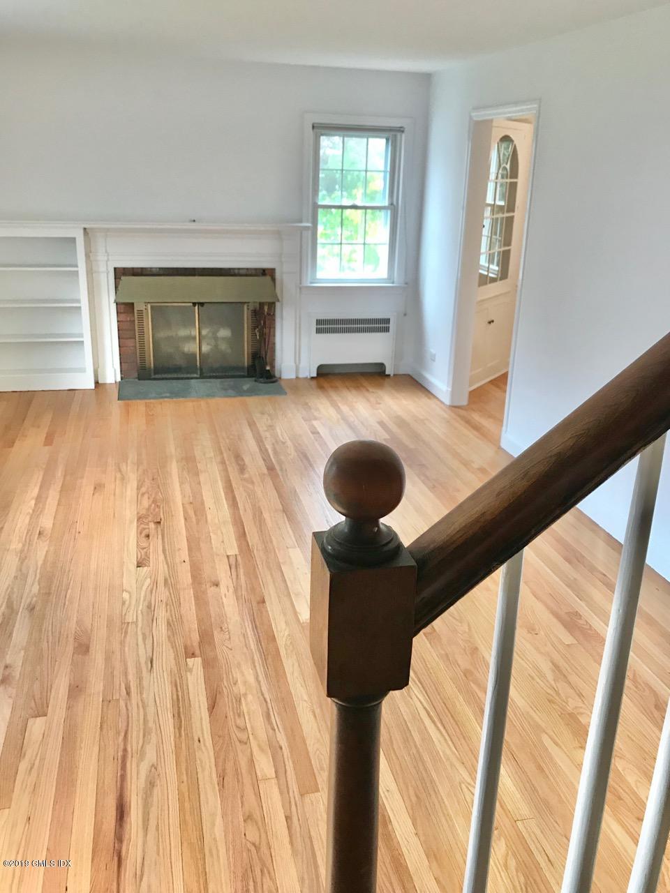 7 River Lane Cos Cob, CT 06807 - Photo 11 of 21 a view of entryway with wooden floor