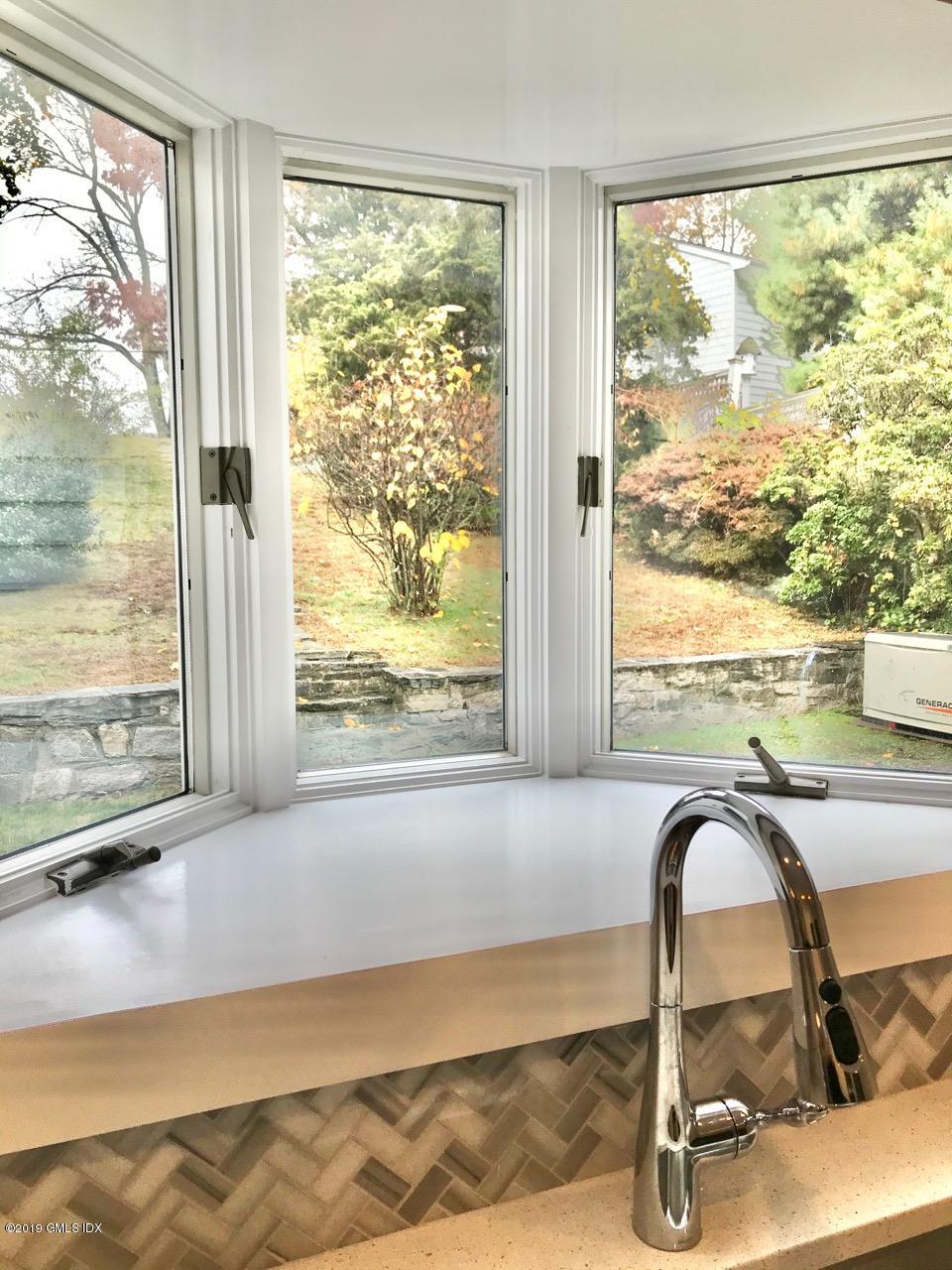 7 River Lane Cos Cob, CT 06807 - Photo 6 of 21 a view of a floor to ceiling window in a room