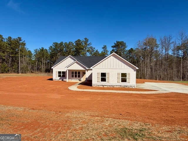 226 Robert Williams Road Pine Mountain, GA 31822 - Photo 2 of 34 a house with trees in the background