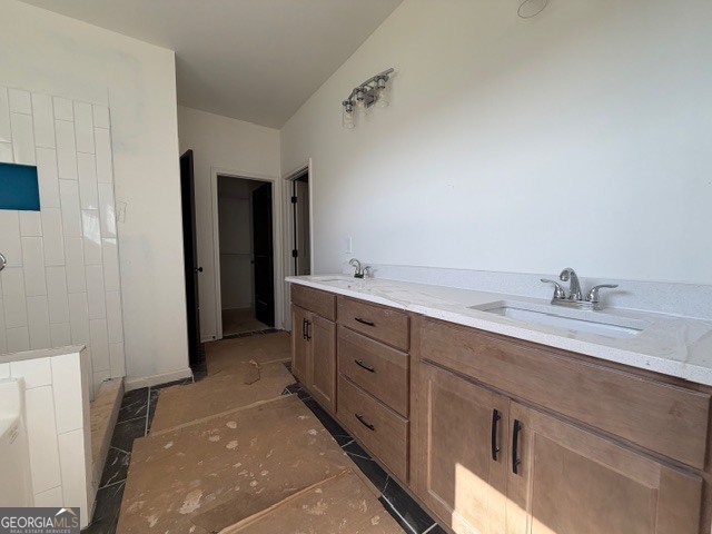 226 Robert Williams Road Pine Mountain, GA 31822 - Photo 22 of 34 a spacious bathroom with double sink and a mirror