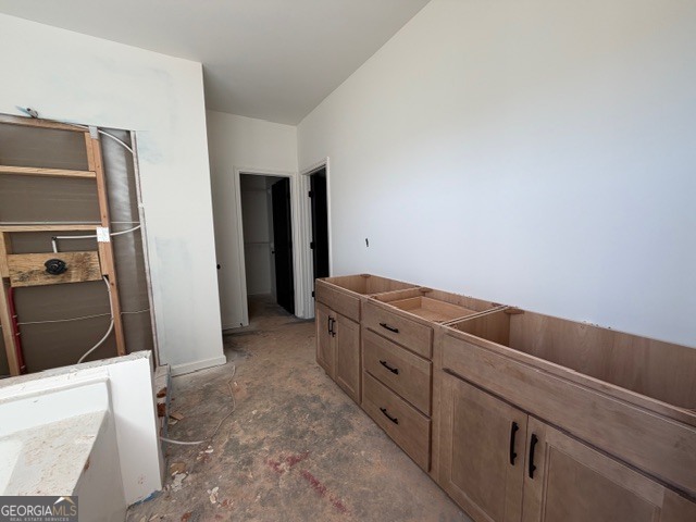 226 Robert Williams Road Pine Mountain, GA 31822 - Photo 23 of 34 a room with baby crib and a couch