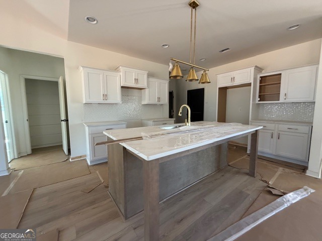 226 Robert Williams Road Pine Mountain, GA 31822 - Photo 6 of 34 a kitchen with a sink stove and cabinets