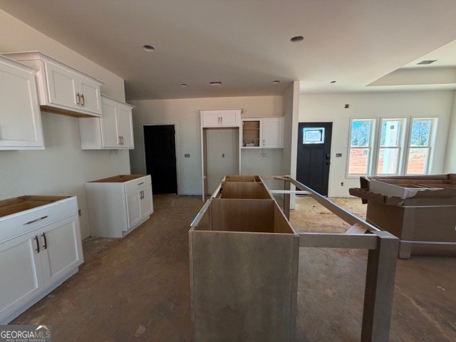 226 Robert Williams Road Pine Mountain, GA 31822 - Photo 7 of 34 a living room with a couch and a table