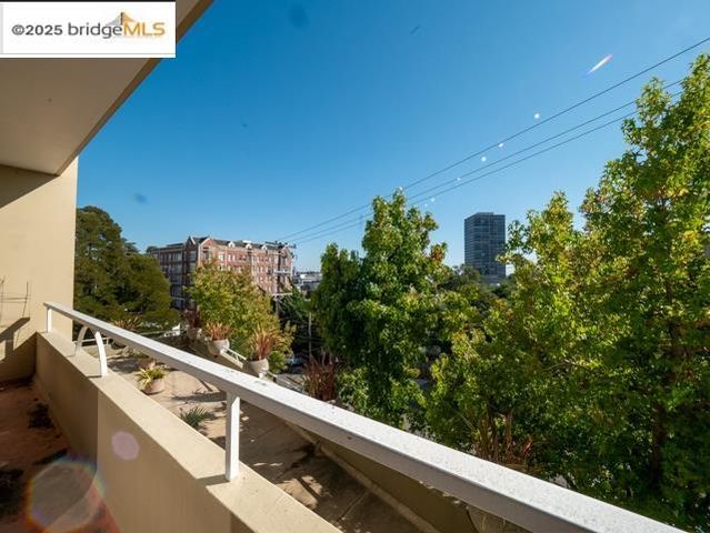 a view of a balcony with an outdoor space