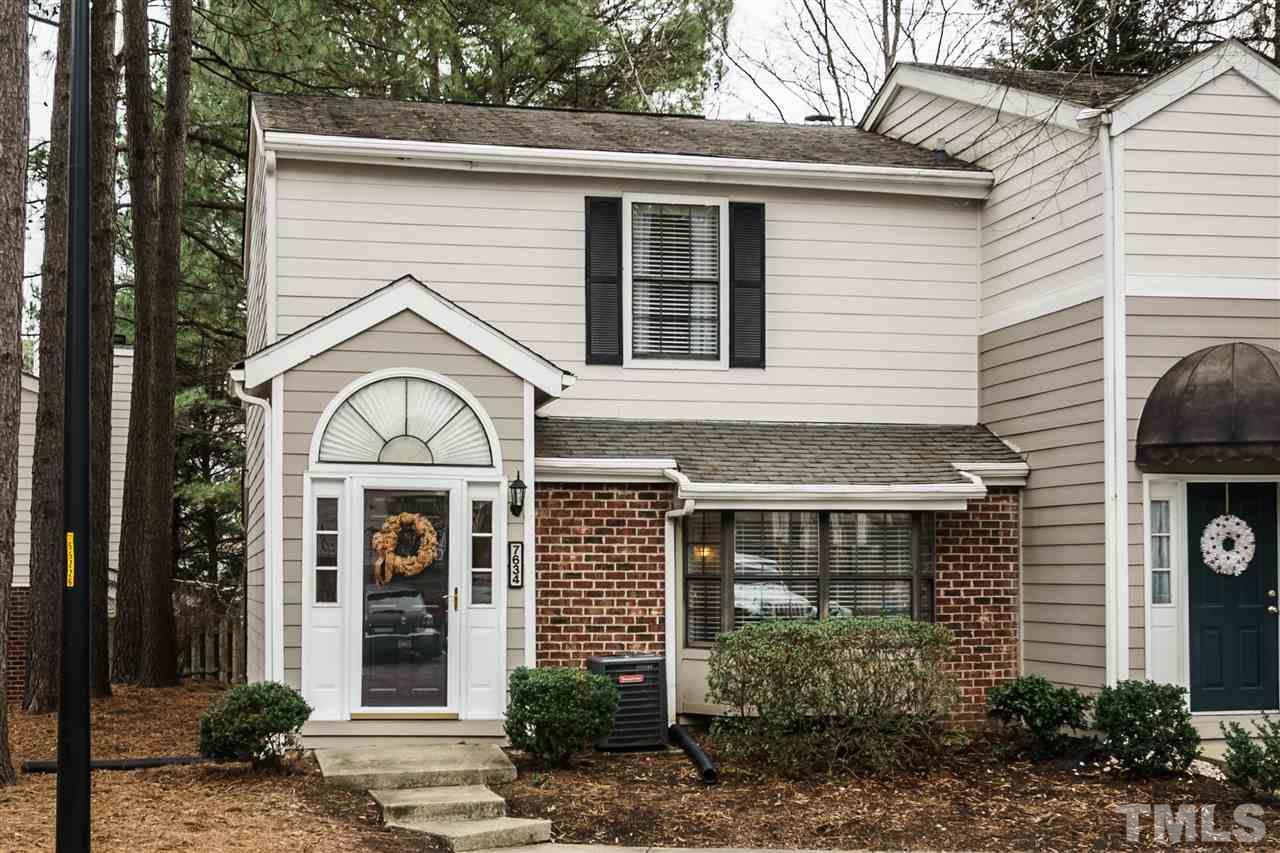 7634 Falcon Rest Circle, Unit 7634 Raleigh, NC 27615 - Photo 1 of 25 a front view of a house with garden